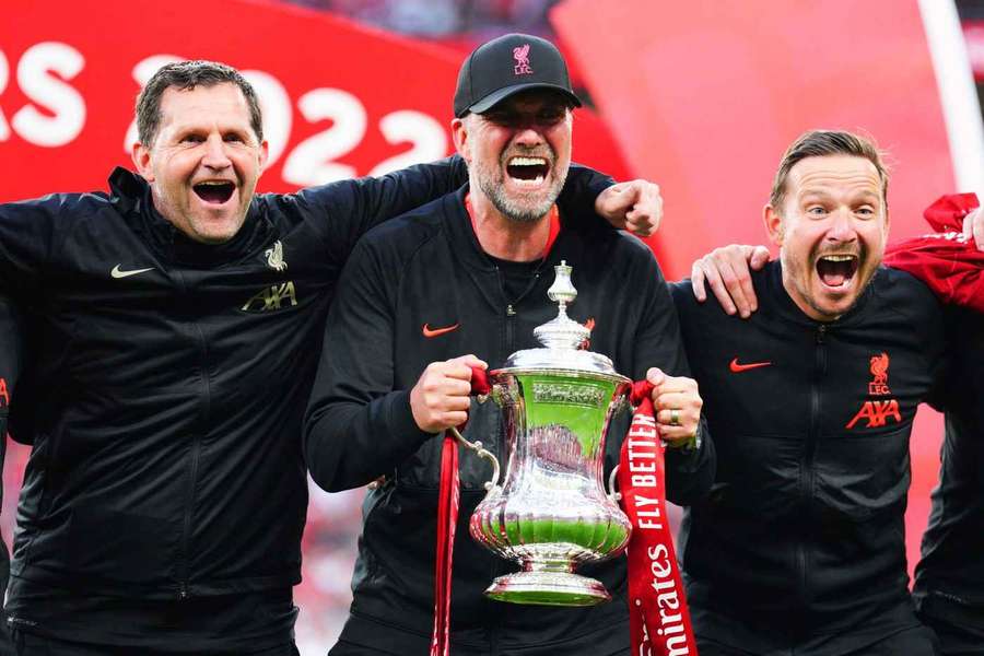 Jurgen Klopp celebrates with Pepijn Lijnders and John Achterberg
(left) after winning the FA Cup in 2022