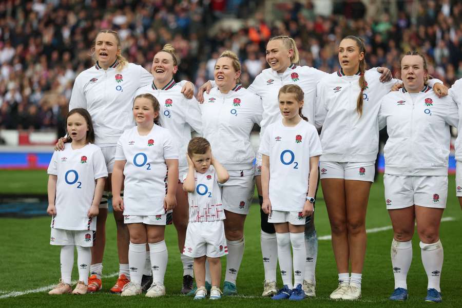 England's players line up for the national anthem