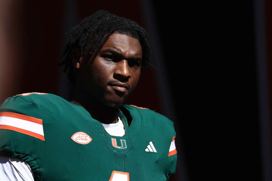 Miami Hurricanes quarterback Cam Ward walking on to the field against Wake Forest (2024)