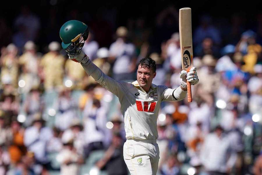 Carey celebrates his 100 for Australia