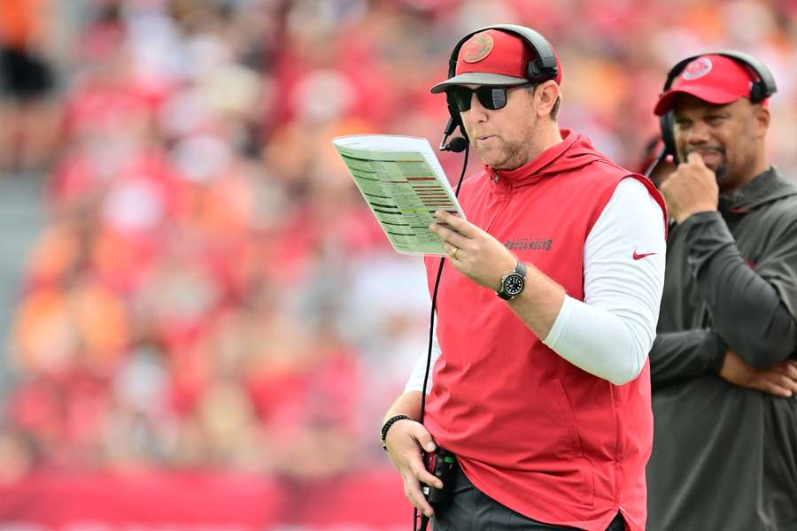 Buccaneers offensive coordinator Liam Coen calling a play in a game against the Carolina Panthers (2024)