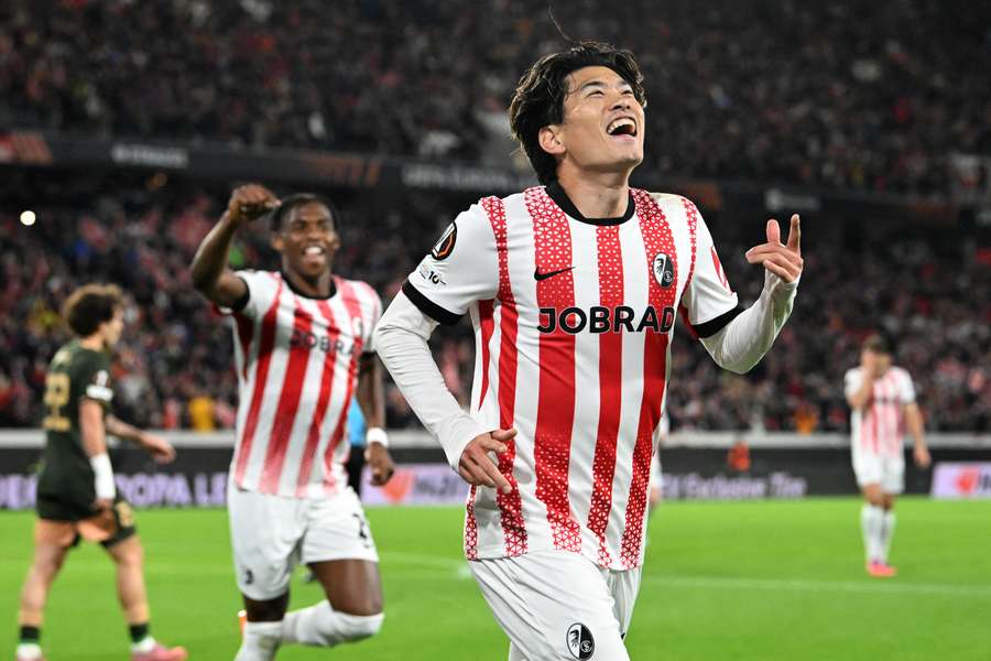 Freiburg's Yuito Suzuki celebrates scoring the 1-0 against FC Utrecht