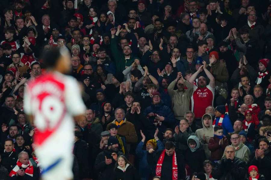 Myles Lewis-Skelly of Arsenal applauds the fans after being substituted