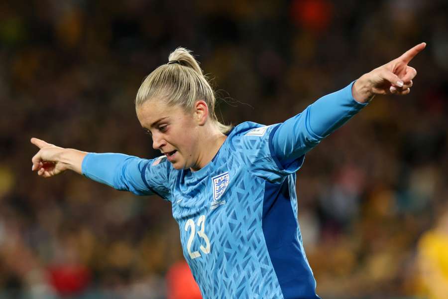 England's forward #23 Alessia Russo celebrates with teammates