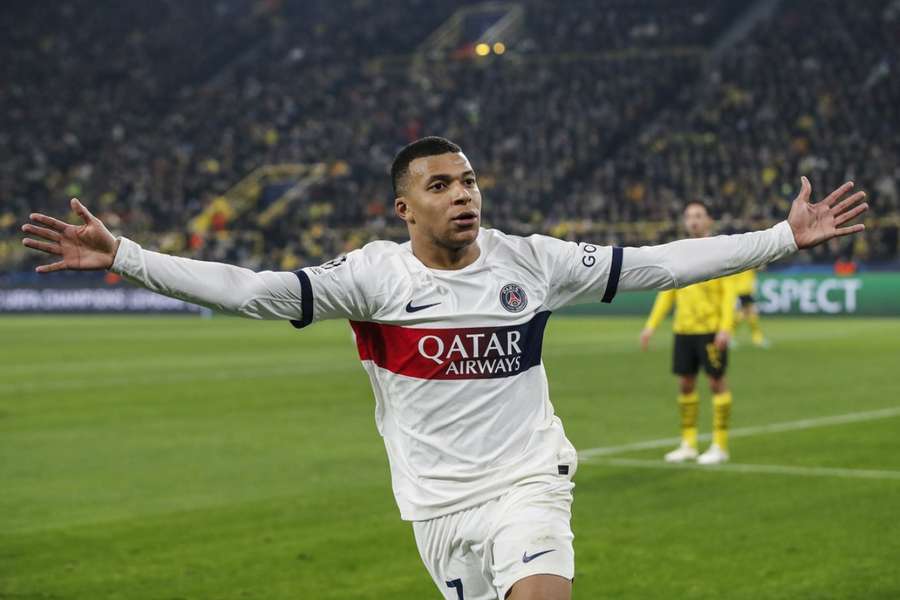 Kylian Mbappé celebrates as PSG book their place in the last-16 of the Champions League