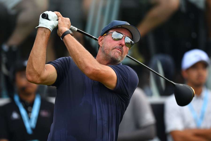 Phil Mickelson lines plays tee shot during the LIV Golf Invitational Bangkok first round at Stonehill Golf Course