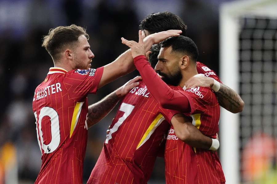 Salah celebrates his goal with teammates