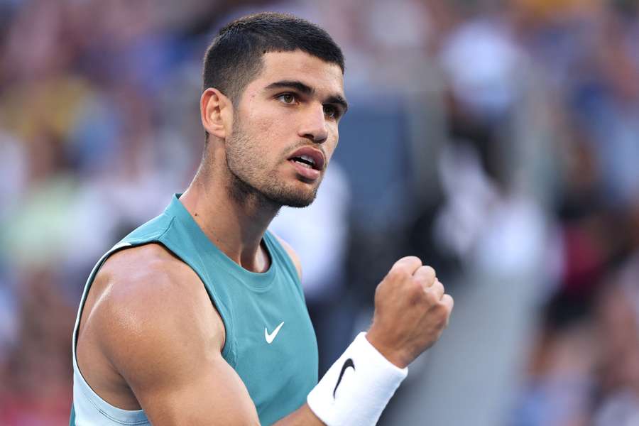 Carlos Alcaraz reacts to a point against Alexander Shevchenko Carlos Alcaraz reacts to a point against Alexander Shevchenko
