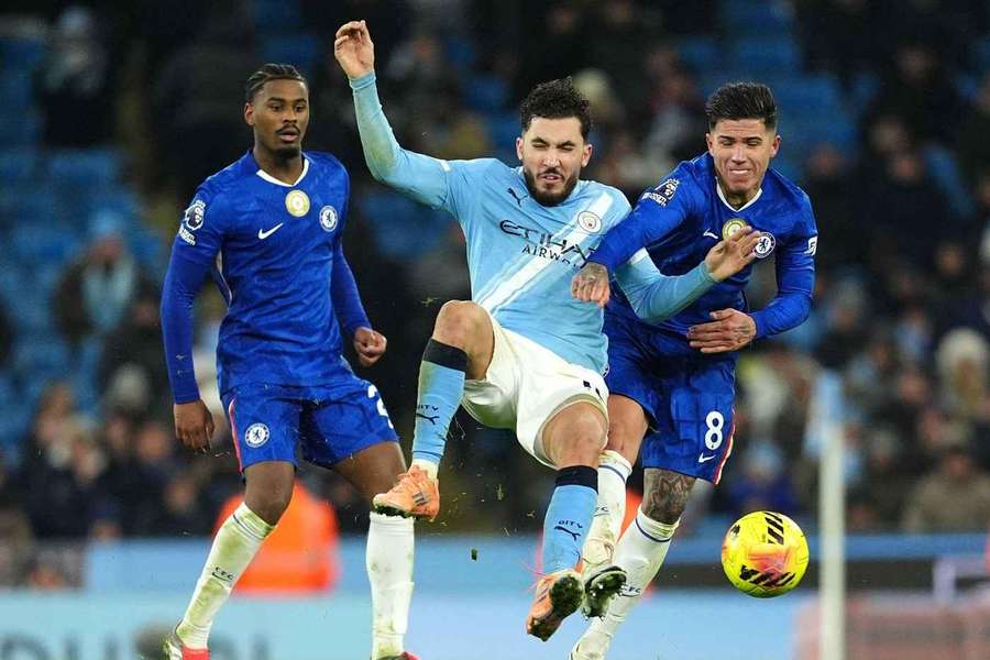 Manchester City's Rayan Cherki and Chelsea's Enzo Fernandez battle for the ball