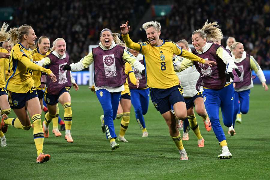 Sweden celebrate wildly after their win