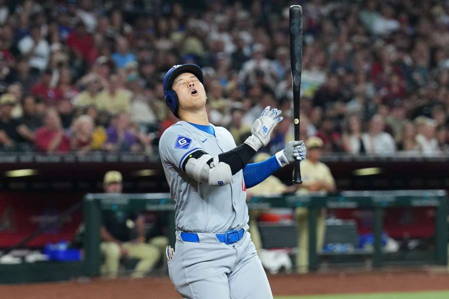 Los Angeles Dodgers two-way player Shohei Ohtani reacts after striking out against the Arizona Diamondbacks