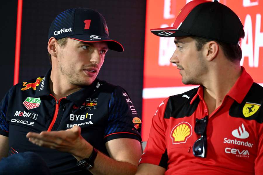 Red Bull Racing's Dutch driver Max Verstappen (R) 