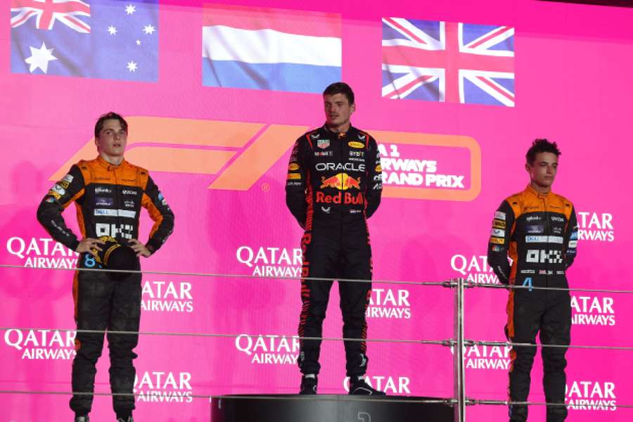 Verstappen stands on top of the podium