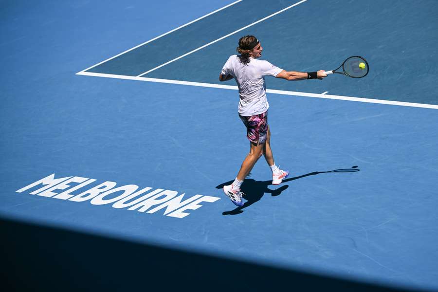 Greece's Stefanos Tsitsipas hits a return against Russia's Karen Khachanov 