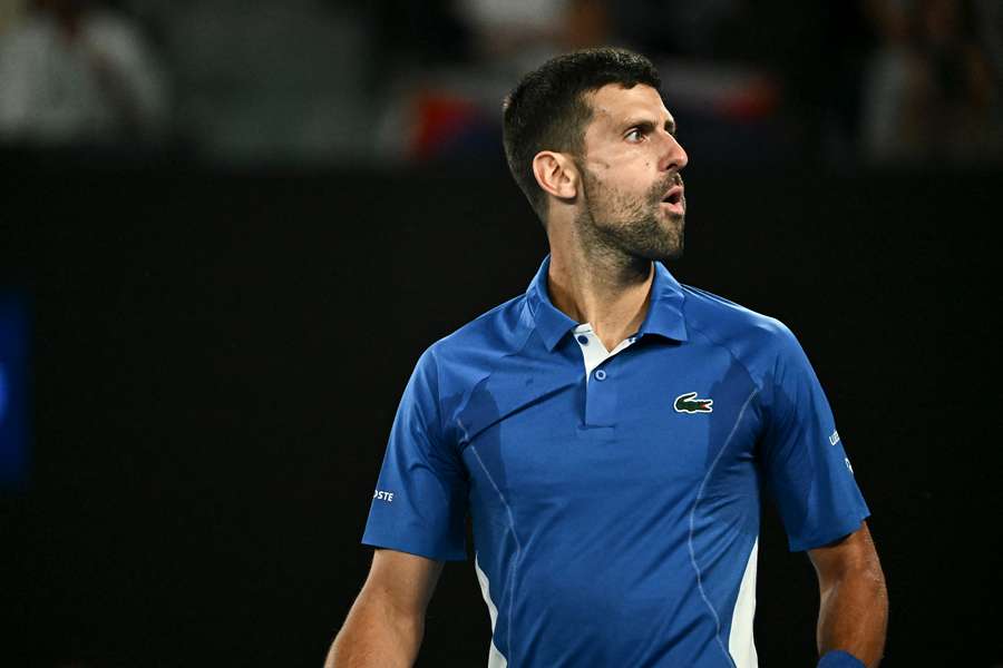 Serbia's Novak Djokovic reacts on a point against Australia's Alexei Popyrin