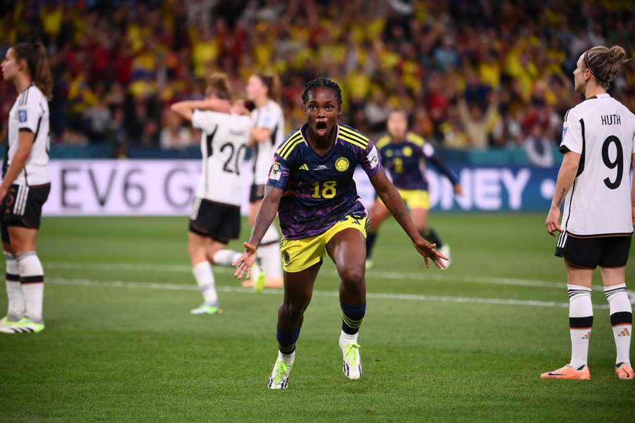 Colombia forward Linda Caicedo (C) celebrates scoring her team's first goal