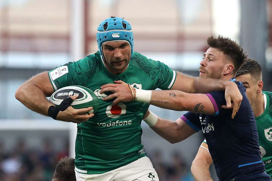 Ireland's Tadhg Beirne in action with Scotland's Ali Price