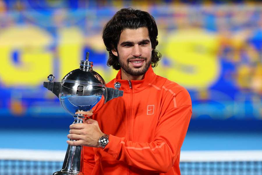 Carlos Alcaraz celebrates with the trophy after winning the final against Jiri Lehecka Carlos Alcaraz celebrates with the trophy after winning the final against Jiri Lehecka