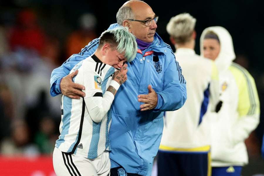 Argentina's Yamila Rodriguez is consoled following her side's exit from the World Cup