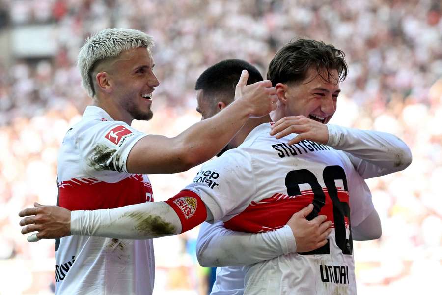 Stuttgart's Deniz Undav (centre) celebrates with Ermedin Demirovic and Angelo Stiller after scoring