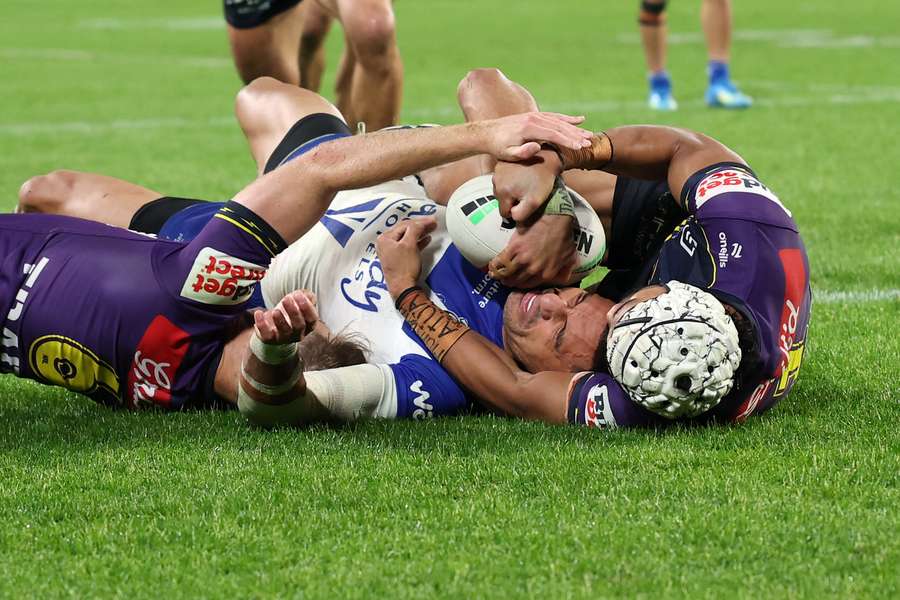 Marcelo Montoya is held up during his final NRL appearance. Marcelo Montoya is held up during his final NRL appearance.