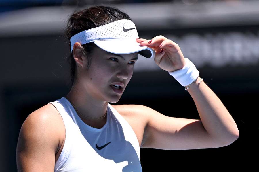 Emma Raducanu reacts on a point against Iga Swiatek
