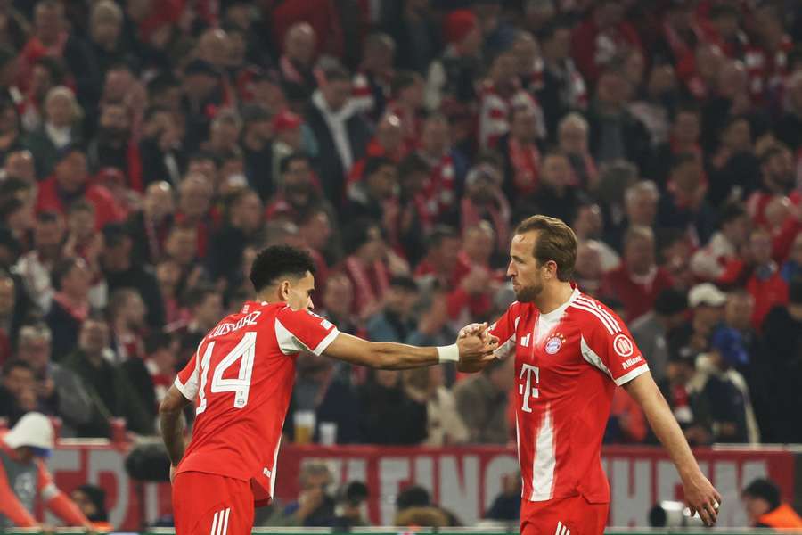 Luiz Diaz and Harry Kane celebrate what proved to be the winning goal for Bayern Munich in the Champions League.