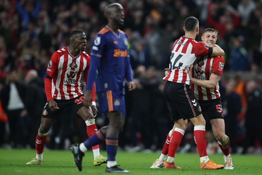 Nordi Mukiele, Granit Xhaka, and Daniel Ballard celebrate at full-time 