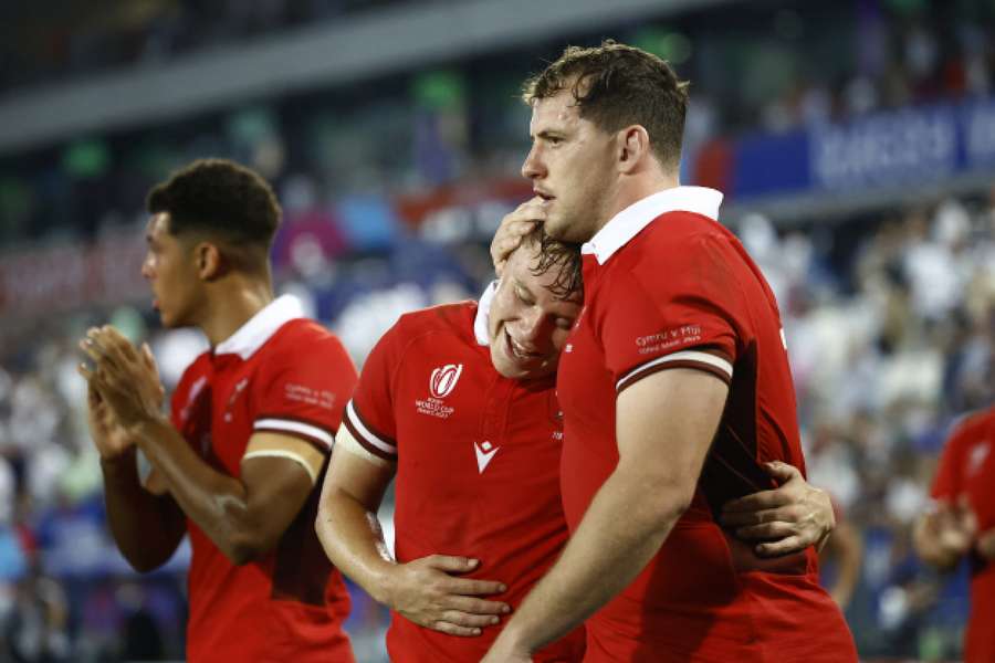 Wales' Sam Costelow and Ryan Elias celebrate after the match