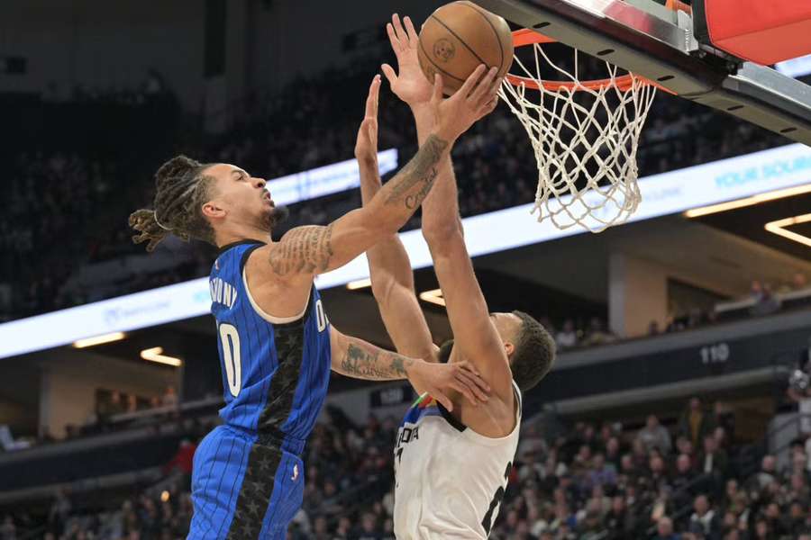 Cole Anthony goes to the basket as Gobert defends during the second quarter Cole Anthony goes to the basket as Gobert defends during the second quarter