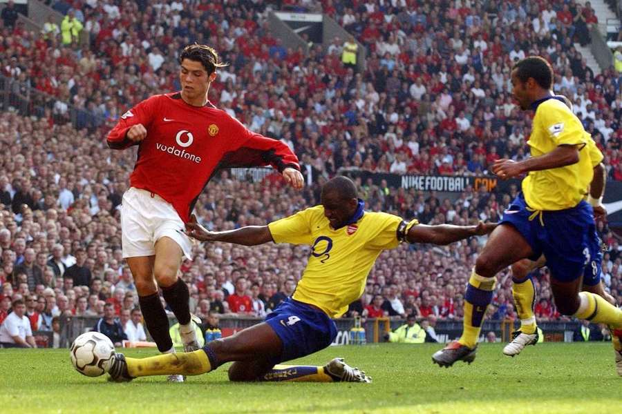 Cristiano Ronaldo is tackled by Patrick Vieira