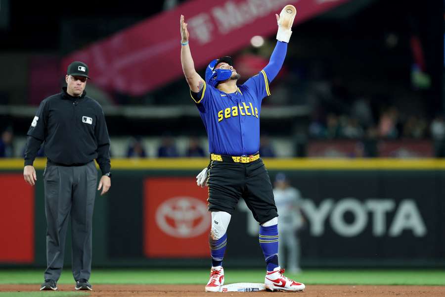 Mariners' Josh Naylor celebrates his 30th stolen base of the 2025 season
