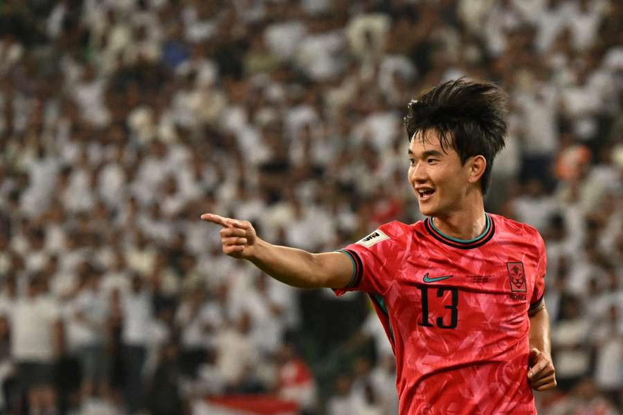 Kim Jing-Yu celebrates his goal for South Korea
