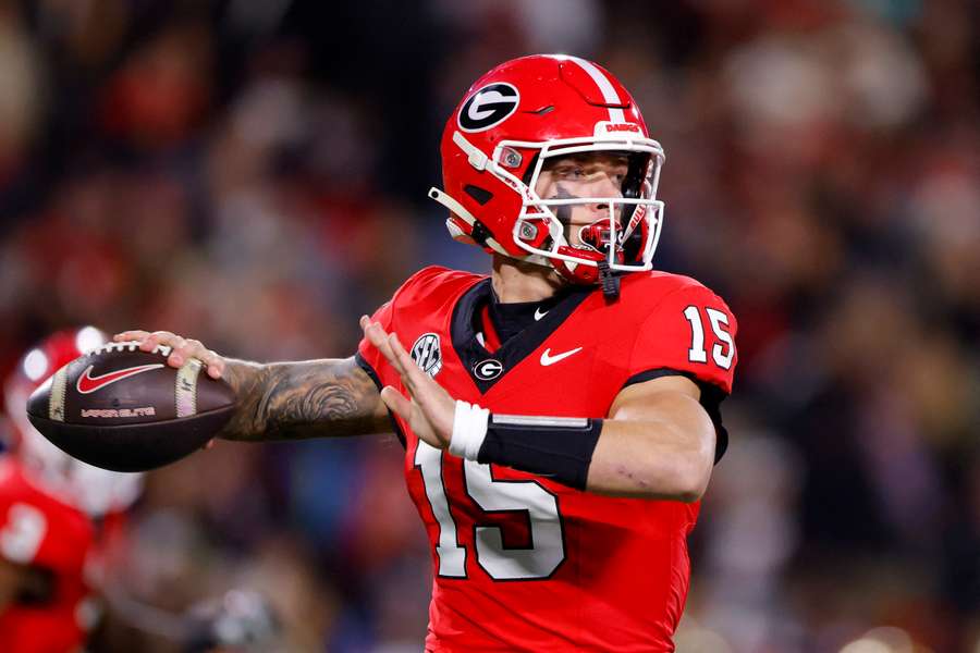 Georgia quarterback Carson Beck steps back for a pass in the 2024 SEC Title game against Texas