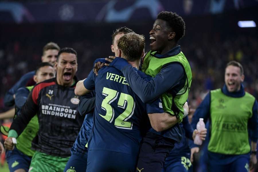 PSV players celebrate their dramatic late winner