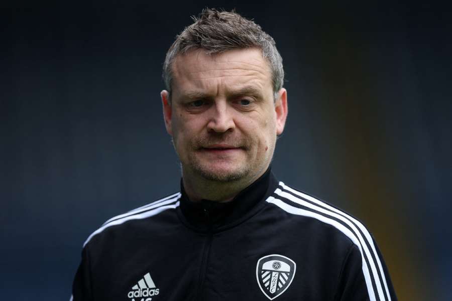 Leeds United coach Michael Skubala on the pitch before the match