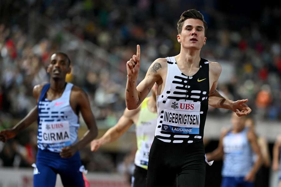 Jakob Ingebrigtsen crosses over the line to win the 1500m in Lausanne