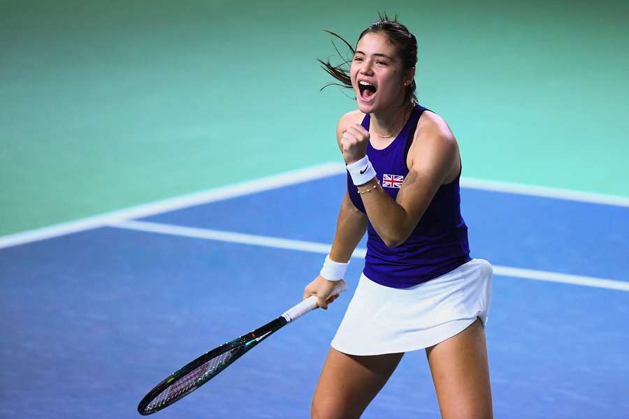 Great Britain's Emma Raducanu reacts after winning her semi-final singles match against Slovakia's Viktoria Hruncakova