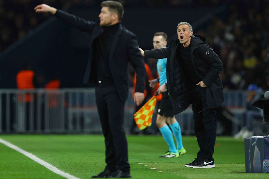 Luis Enrique and his opposite number Sebastien Pocognoli. Luis Enrique and his opposite number Sebastien Pocognoli.