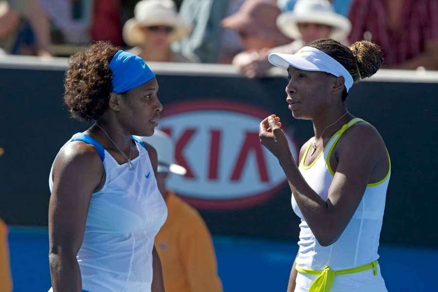 Venus (R) and Serena Williams in 2009