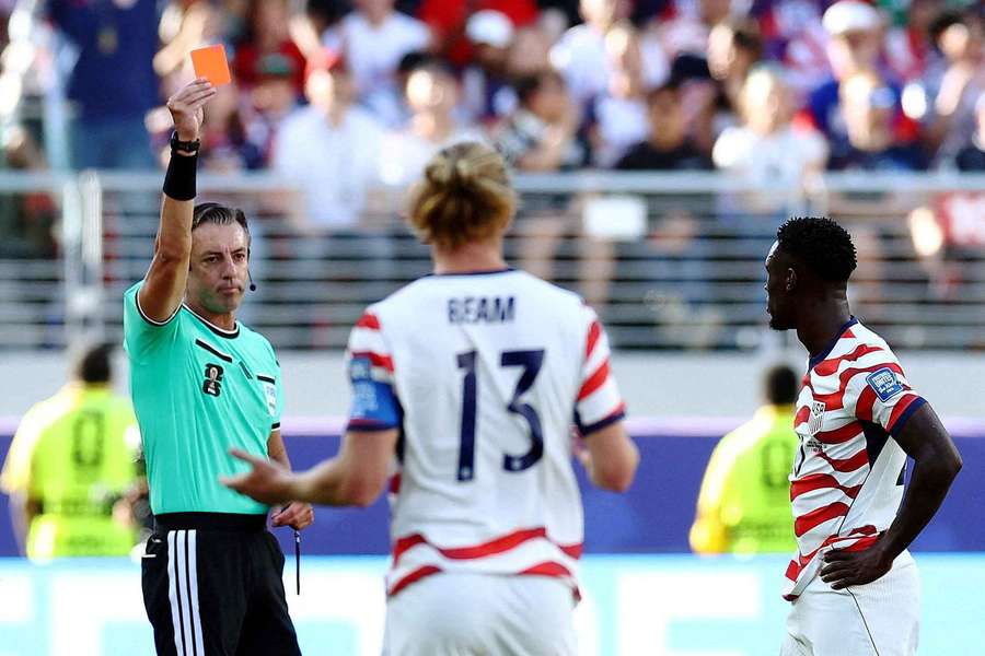 FIFA ref Raphael Claus gives Folarin Balogun a red card FIFA ref Raphael Claus gives Folarin Balogun a red card