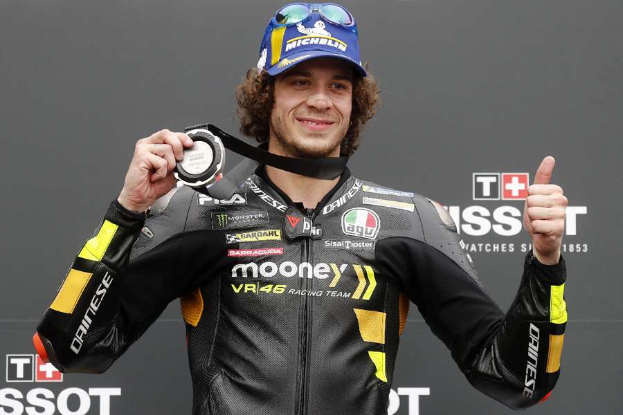 Marco Bezzecchi poses with a medal