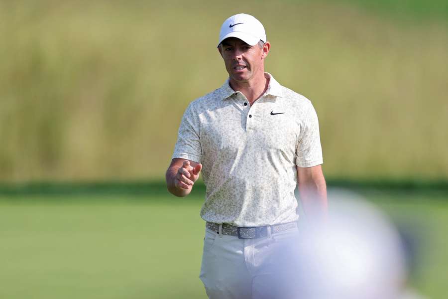 Rory McIlroy reacts after making par on the 14th green during the first round of the 125th US Open