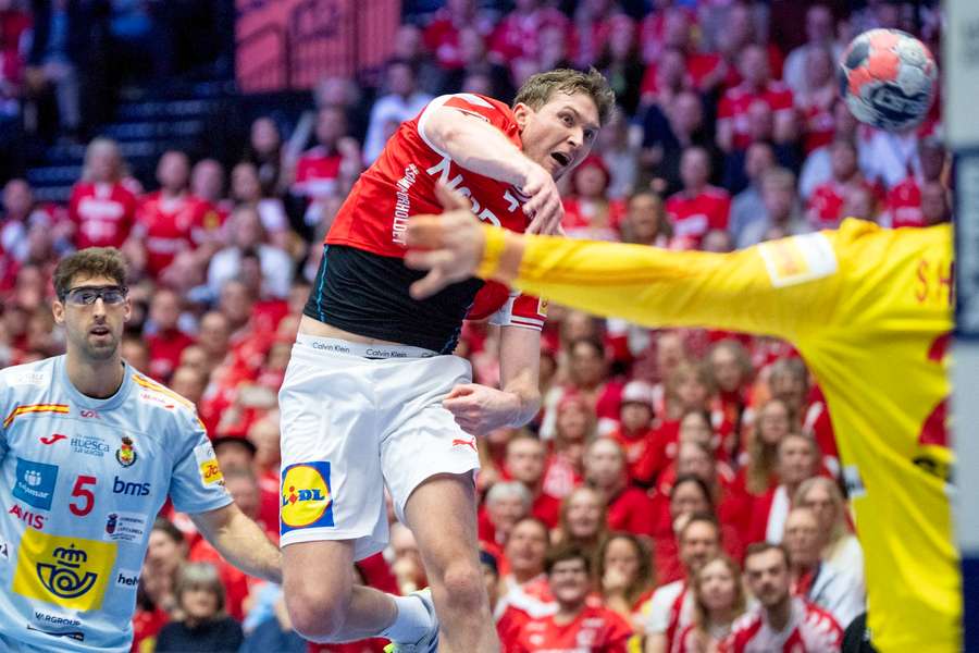 Winger Magnus Landin scores one of the Danish goals against Spain