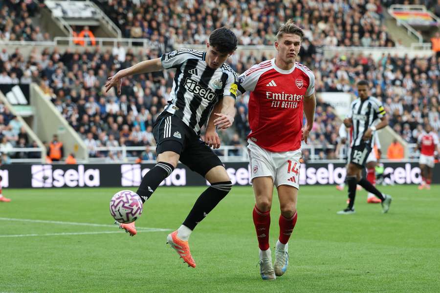 Livramento (left) in action against Arsenal