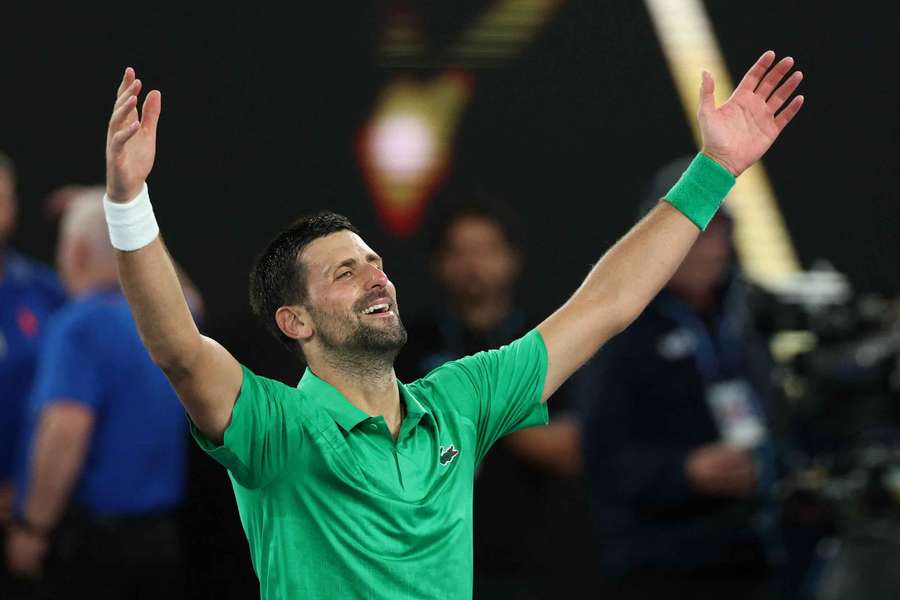 Novak Djokovic celebrates winning his semi-final against Jannik Sinner 