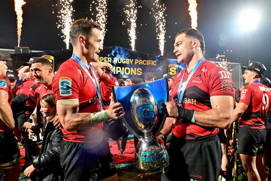 Crusaders duo David Havili and Will Jordan celebrate their Super Rugby Pacific Grand Final victory. 