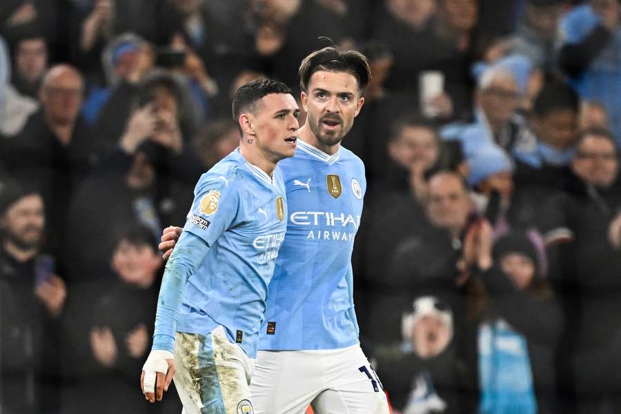 Phil Foden (L) and Jack Grealish (R) were targeted by Manchester United fans