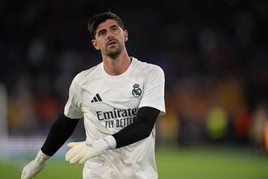 Thibaut Courtois warms up ahead of Real Madrid's Champions League match against Roma Thibaut Courtois warms up ahead of Real Madrid's Champions League match against Roma