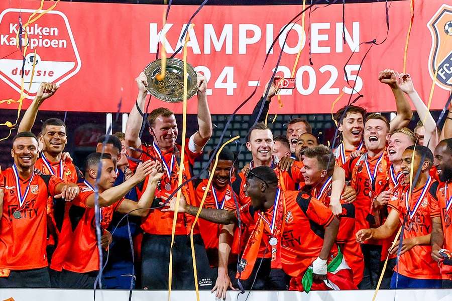 FC Volendam captain Henk Veerman hoists the Keuken Kampioen Divisie trophy